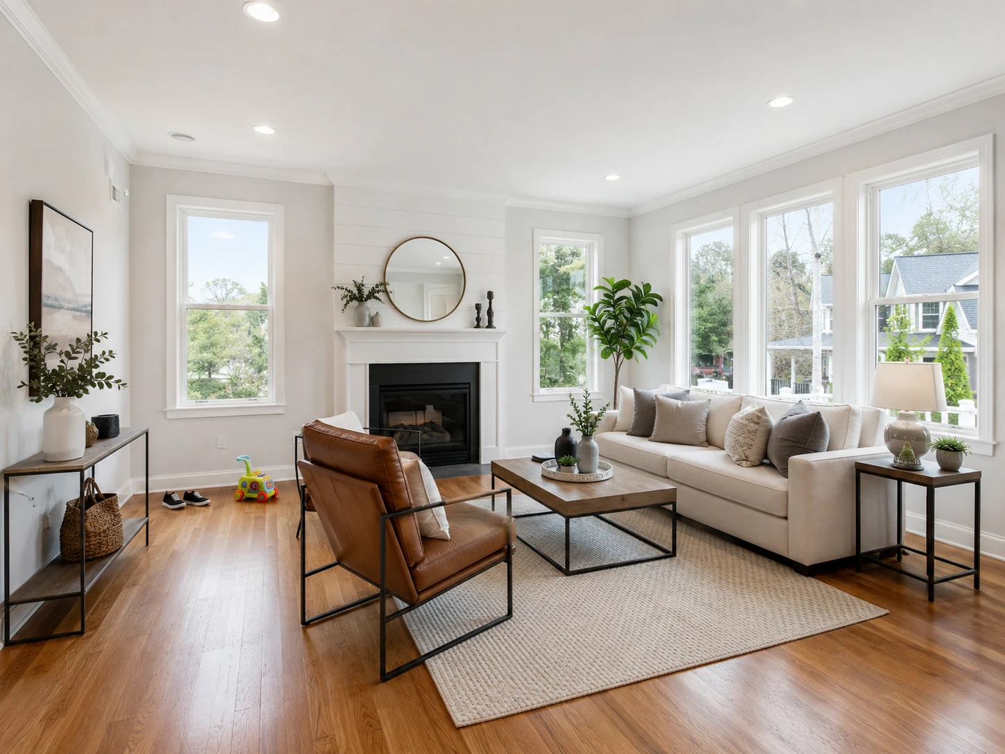 Modern living room interior with shoes and a child's toy left in the corner