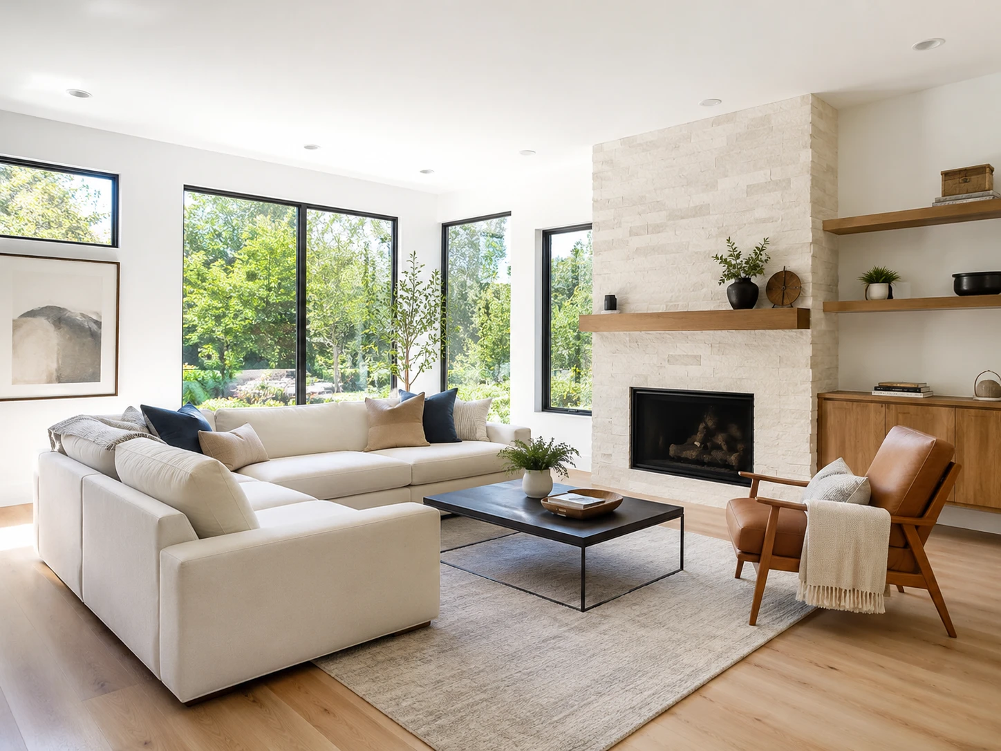 Bright modern living room interior with large windows